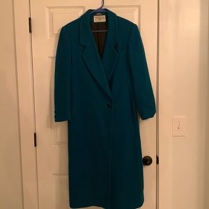 Emerald green international scene over coat
